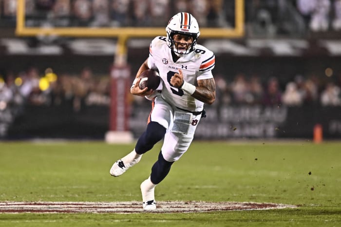 Nov 5, 2022; Starkville, Mississippi, USA; Auburn Tigers quarterback Robby Ashford (9) runs the ball against the Mississippi State Bulldogs during the second quarter at Davis Wade Stadium at Scott Field. Mandatory Credit: Matt Bush-USA TODAY Sports